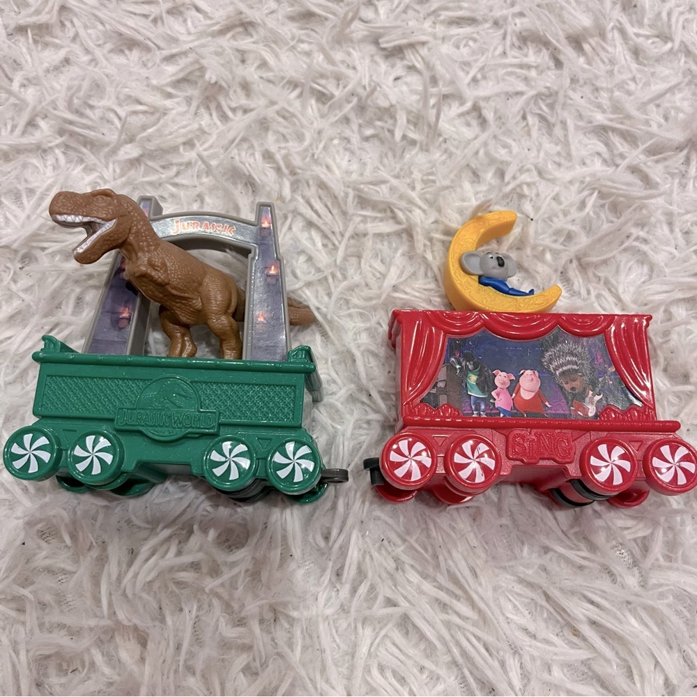 2017 Universal Studios McDonalds Express Train Jurassic Park Sing Cars